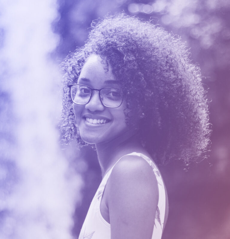 Woman standing and smiling